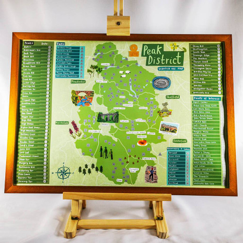 Full view of a framed map of the Peak District Scratch Off Map on an easel