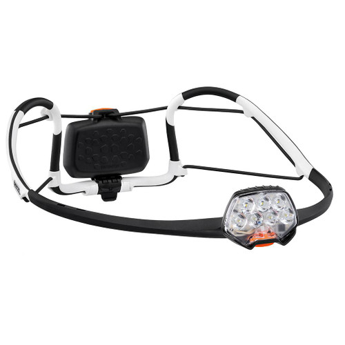 Fully open, ready to wear view of the Petzl IKO Headlamp in black abd white.