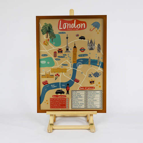 Full view of a framed map of the London Scratch Off Map on an easel