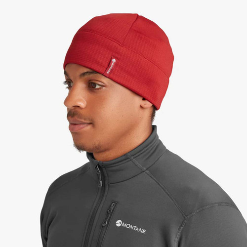 Person wearing Red Protium Beanie Hat by Montane