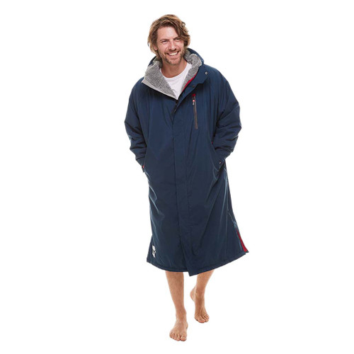 Person standing wearing the Red Paddle Co Pro Change EVO Navy Long Sleeve Outdoor Robe zipped facing forward