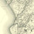 Close up of authentic reproduction of Ordnance Survey map of Harlech 1896-1904 with a yellow tint background