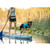 Person paddleboarding with a dog on the board facing the camera while wearing the Ruffwear Float Coat Dog Life Jacket in blue