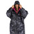 Close up of person standing wearing the Dryrobe Advance Adults Black Camo Pink Long Sleeve Outdoor Robe with the hood up