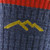 Close-up of the Darn Tough Men's Hiker Micro Crew Midweight Socks in Denim blue showing the logo in yellow on the grip