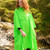 Full length view of a person wearing Mac in a Sac Origin 2 Adult Neon Green Poncho front view