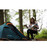 Vango Soul 200 CLR Tent 2 person tent pitched up and door zipped in woodland with woman preparing a meal