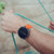 Person wearing Suunto Vertical Titanium Solar Canyon GPS Watch on wrist
