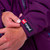 Close up of the sleeve on Red Paddle Co Pro Change EVO Mulberry Long Sleeve Outdoor Robe showing the logo on the cuff