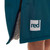 Close up of the white Red logo on Red Paddle Co Pro Change EVO Teal Long Sleeve Outdoor Robe