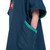 Close up of child wearing the Red Paddle Kids Quick Dry Navy Change Robe with focus of the pockets with hands in the pockets
