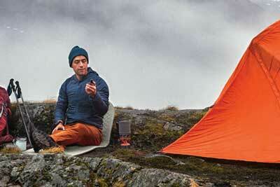 Person using a GPS outdoors while hiking