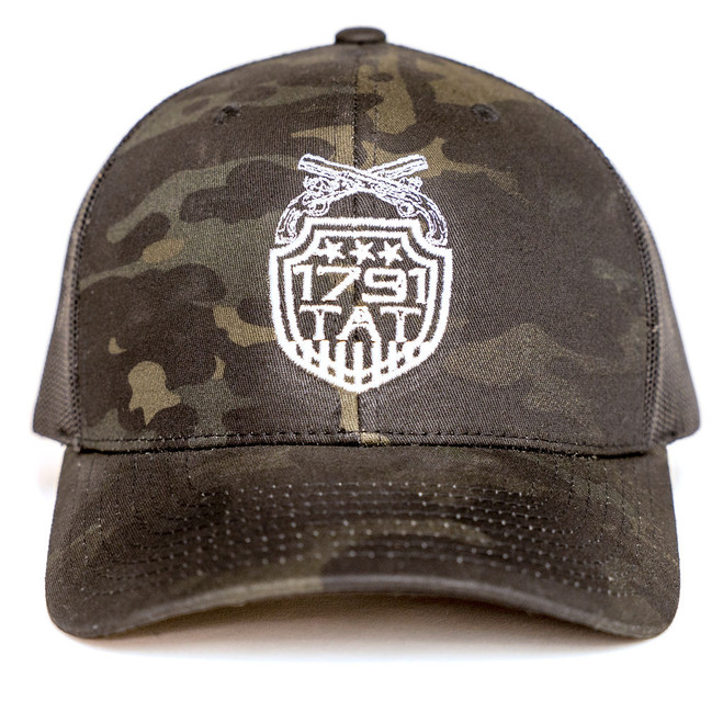 Black Camo 1791 TAT Trucker Hat with white embroidered shield logo. Tactical-style headwear for firearms training and community recognition.