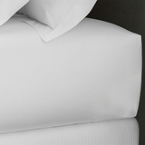 Summit white fitted sheet on bed