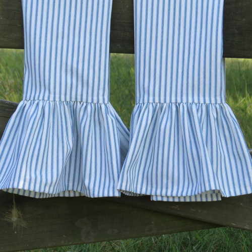 Closeup of pair of blue ticking stripe tea towels