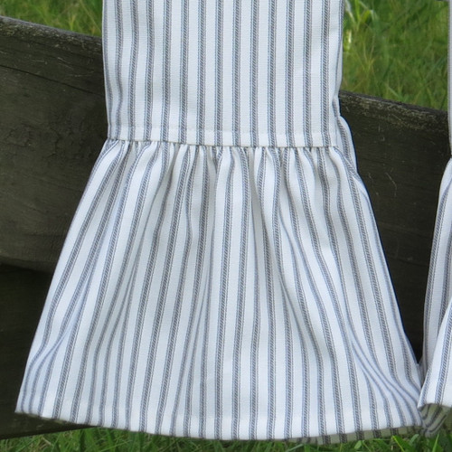 Closeup of ruffle of gray ticking stripe towel