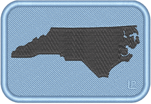 North Carolina Silhouette - UNC Black on Tarheel Blue 2x3 Loyalty Patch North Carolina Silhouette - UNC Black on Tarheel Blue 2x3 Loyalty Patch