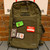 OD Green Patch Collector Backpack - back with patches