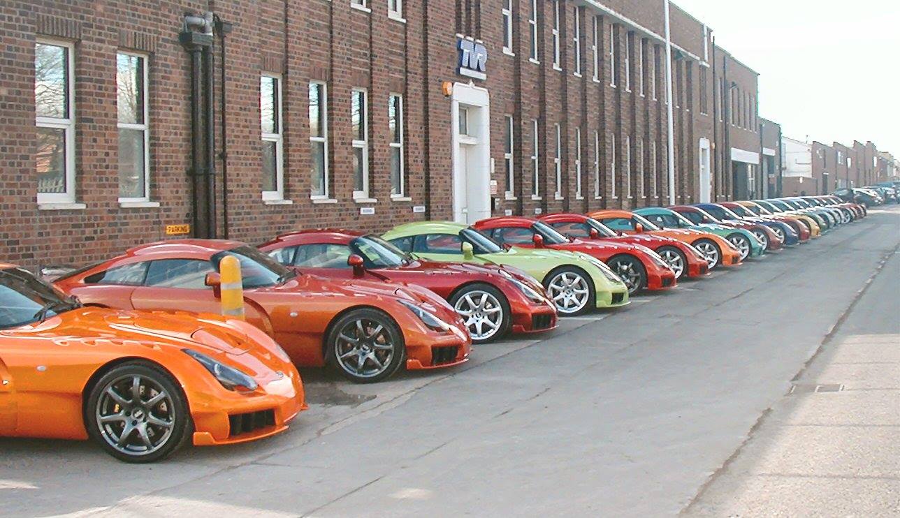 Wide Image of TVR Cars Racing on Track