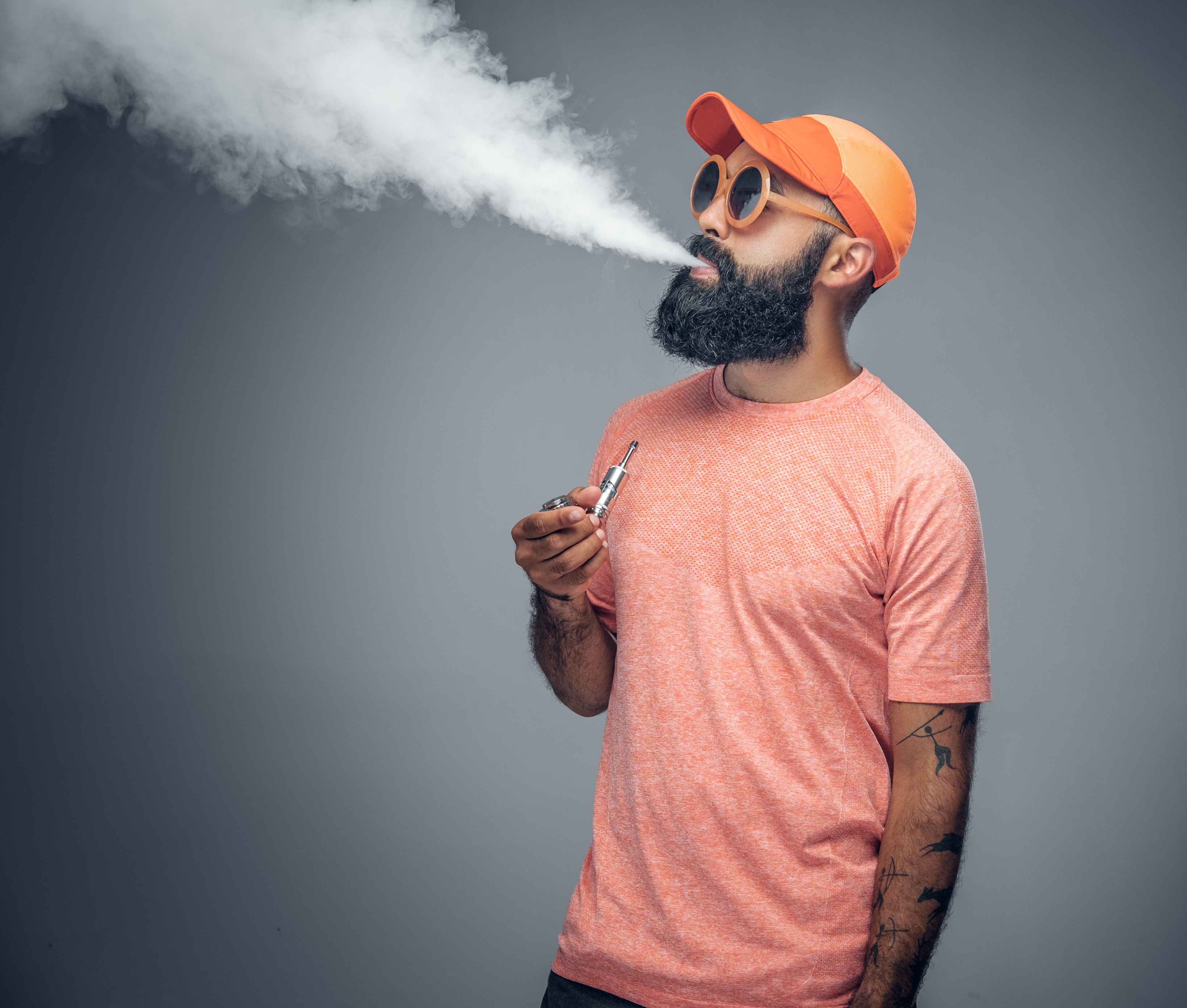 Friends relaxing and enjoying premium cannabis products together — Master Dispensary