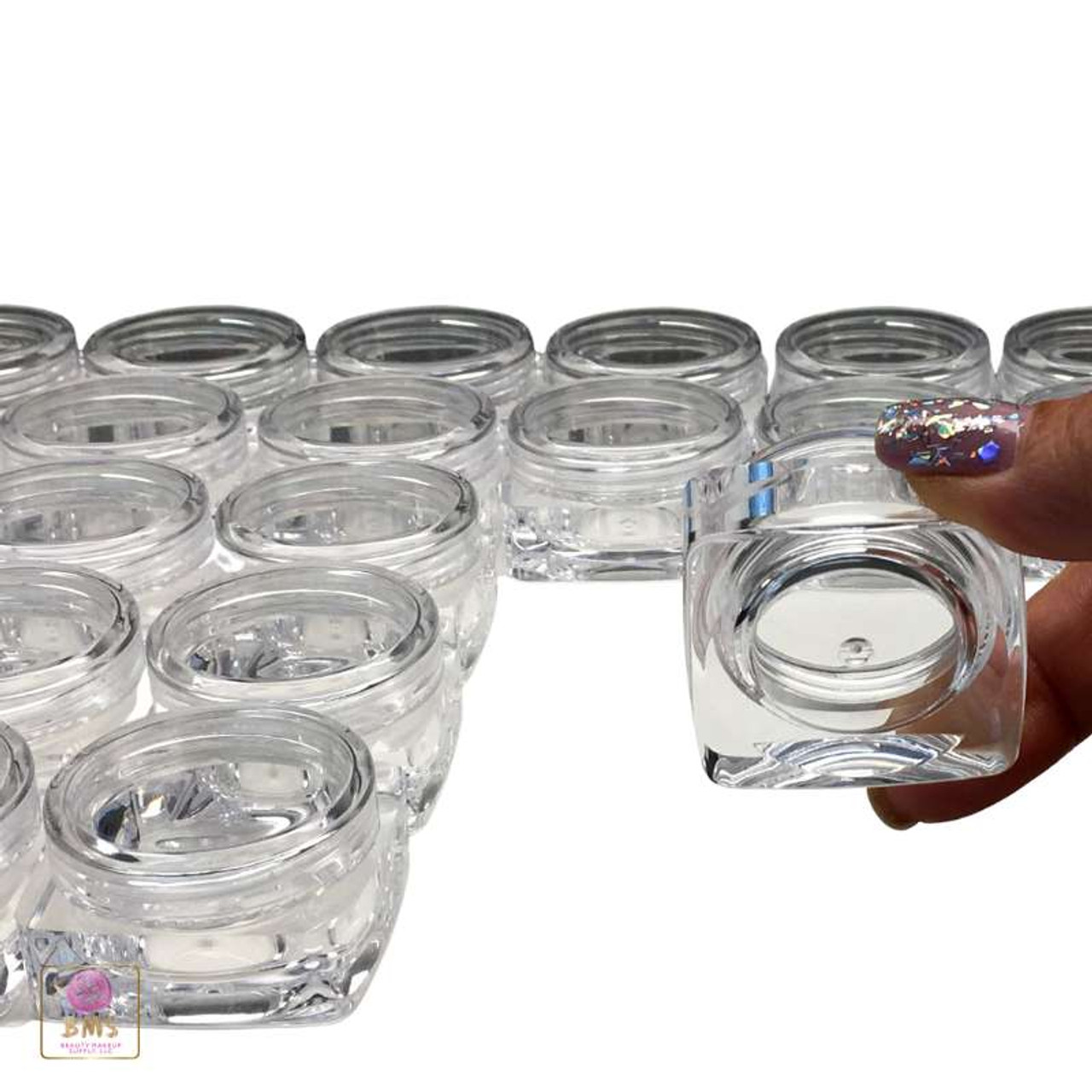 https://cdn11.bigcommerce.com/s-qd7k5gxi/images/stencil/1280x1280/products/264/6396/Cosmetic-Jars-Thick-Wall-Square-Beauty-Containers-10-Ml-Clear-White-Black-Cap_6225__22617.1660975774.jpg?c=2?imbypass=on