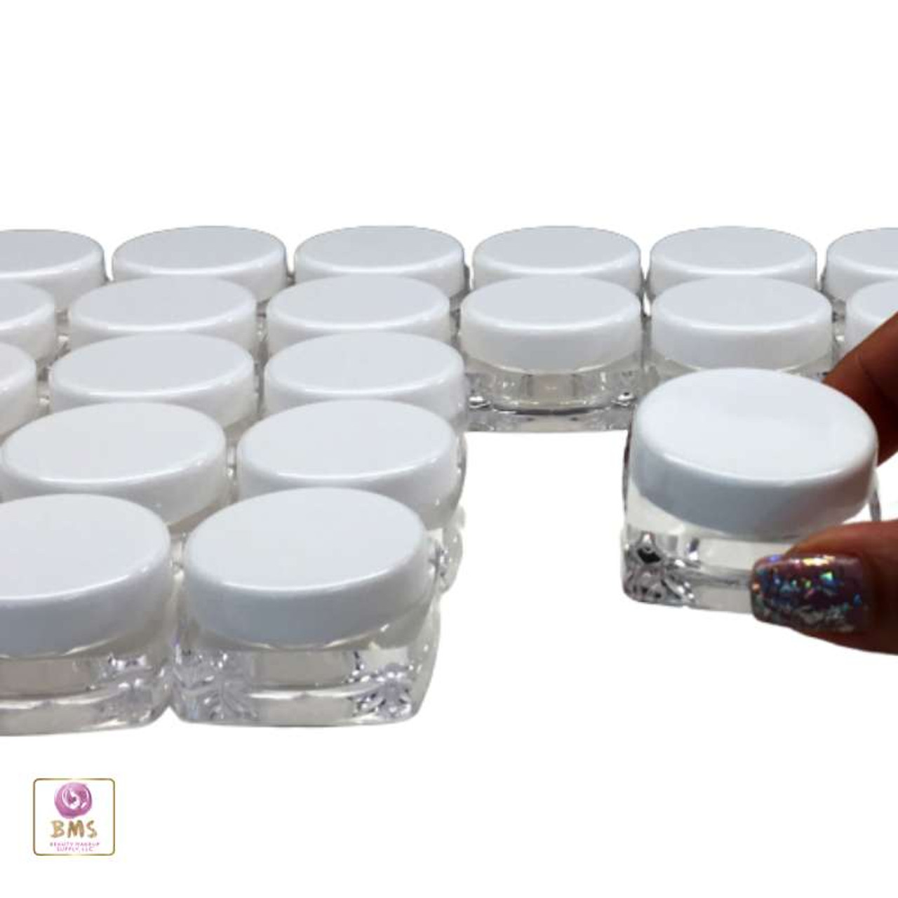https://cdn11.bigcommerce.com/s-qd7k5gxi/images/stencil/1280x1280/products/264/6397/Cosmetic-Jars-Thick-Wall-Square-Beauty-Containers-10-Ml-Clear-White-Black-Cap_6226__02516.1660975777.jpg?c=2?imbypass=on