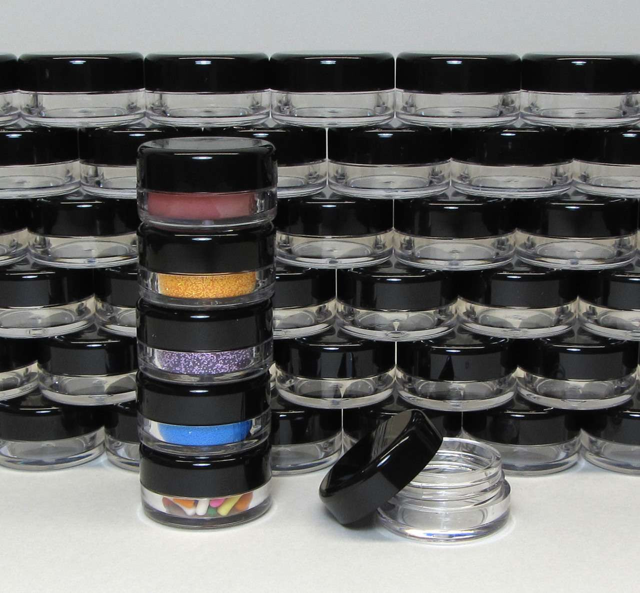 https://cdn11.bigcommerce.com/s-qd7k5gxi/images/stencil/1280x1280/products/362/6543/Cosmetic-Jars-Plastic-Lip-Balm-Beauty-Containers-with-Lids-3-Gram-Clear-White-Black-Lid-Beauty-Makeup-Supply_4438__90560.1661010868.jpg?c=2?imbypass=on