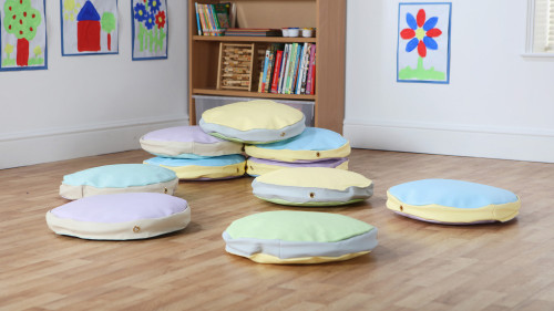 An image of Story Cushions in pastel colours