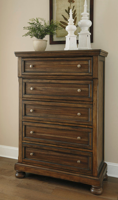 Flynnter Medium Brown Five Drawer Chest