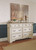Realyn Two-tone 6 Pc. Dresser, Mirror, Chest & King Upholstered Panel Bed