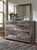 Derekson Multi Gray King Panel Bed With 4 Storage Drawers 7 Pc. Dresser, Mirror, King Bed