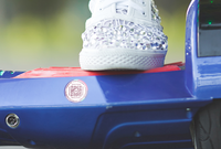 A Lost and Found Label on a blue electric hoverboard.