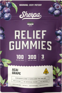 Purple packaging pouch for Sherpa Relief Gummies in Acai Grape flavor. The label reads "WARNING: VERY POTENT" at the top, with "Sherpa" logo and "RELIEF GUMMIES" in large white text. It shows 100 mg per gummy | 300 mg total THC | 3 count. Features illustrations of fresh blueberries and acai grapes around the edges. Includes text: "Caryophyllene & Humulene for Relief", "Fast Acting", "No Artificial Colors", "All Natural", and a yellow triangle cannabis symbol. Small print at bottom: "Net Wt. 4.8 oz (approx.)", "Please use responsibly", "Keep out of reach of children and pets".
