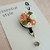 Handmade - CLAY - Retractable Badge Reel - 'Textured Floral' - Sage Green/Peach/Orange/White