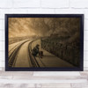 Man Squatting On Tracks Steam Train Coming Wall Art Print