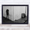 Kids crouched by wall sad little girl black and white Wall Art Print