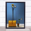 Still-life yellow shovel plant pot light switch Wall Art Print