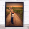 Little boy and dog muddy path fields sunset Wall Art Print