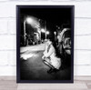 The Night woman crouching by car Wall Art Print