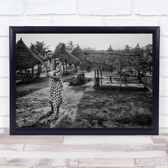 Mother and child African village black and white huts Wall Art Print