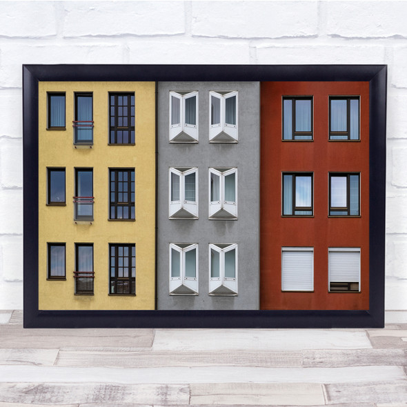 Building red yellow grey windows The Shape Of Colors Wall Art Print