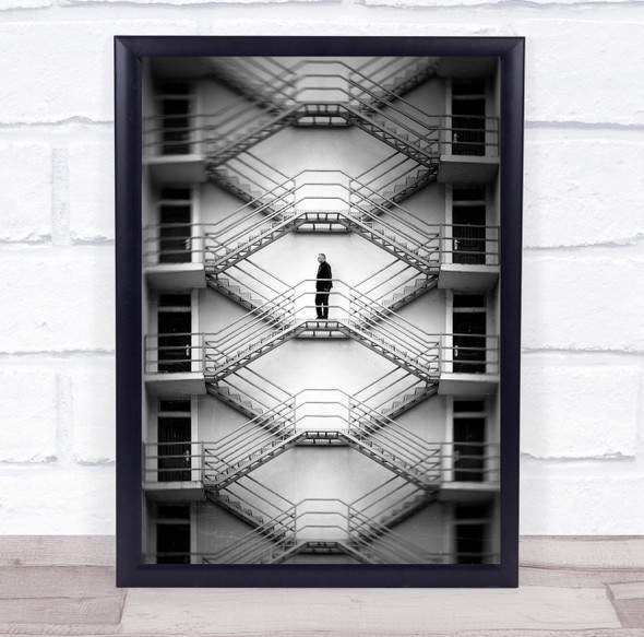 Symmetry Staircase Man standing black and white Wall Art Print