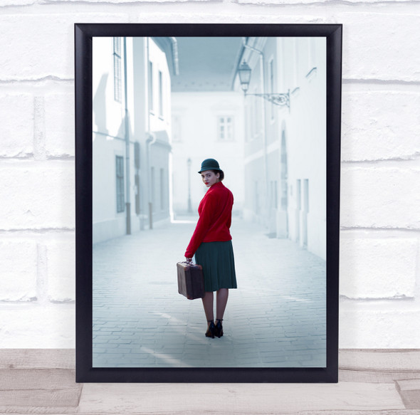 Looking Back woman luggage white buildings Wall Art Print