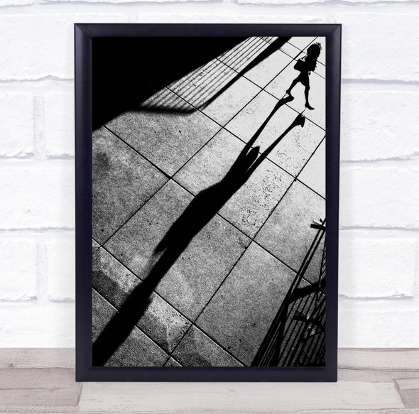 long shadow woman walking concrete floor Wall Art Print