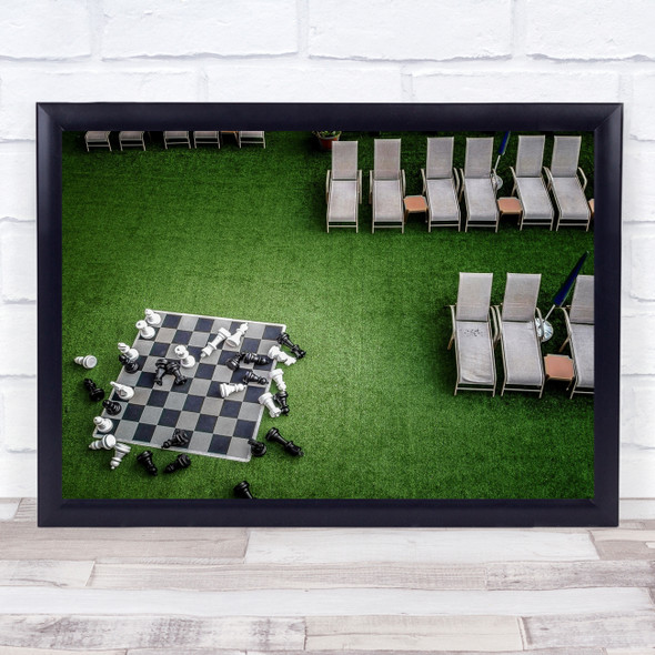 Split Opinions chess board deck chairs Wall Art Print