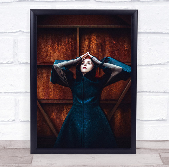 Blue jacket woman hands on head Wall Art Print