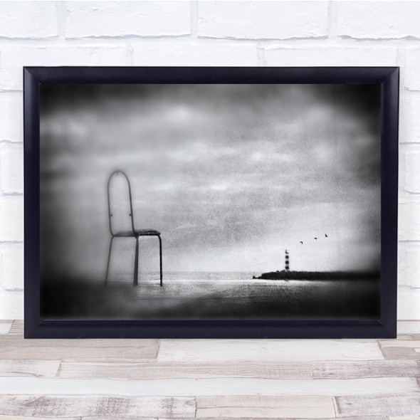 Chair on shore lighthouse eerie Wall Art Print