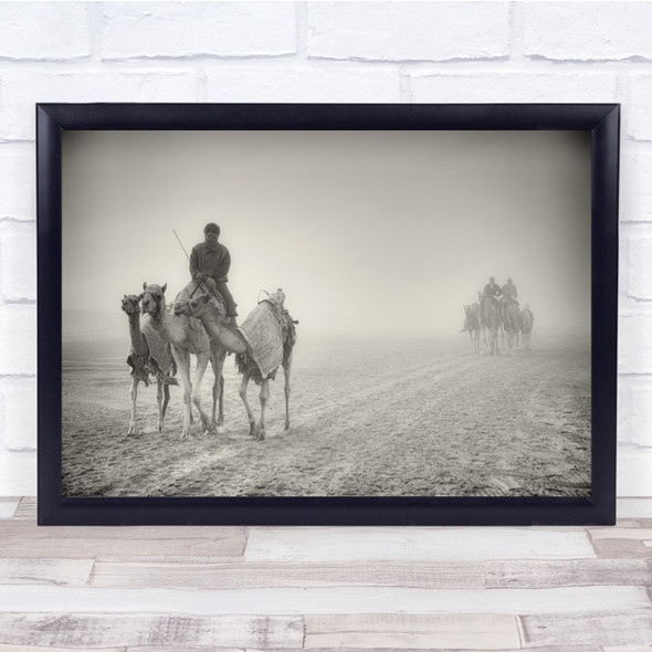 Man Camels on a cold misty path Wall Art Print