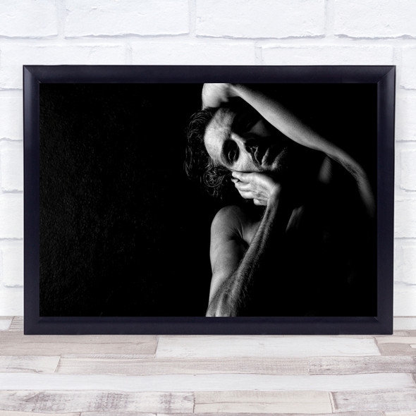 Man grabbing head dark pose Wall Art Print