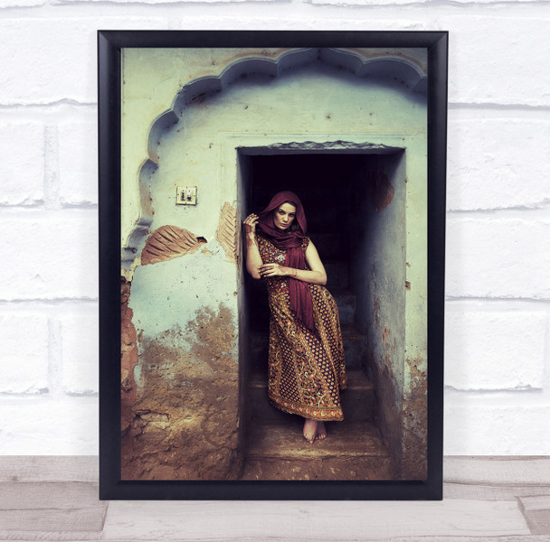 Rajasthan woman wearing sari and head robe in doorway Wall Art Print